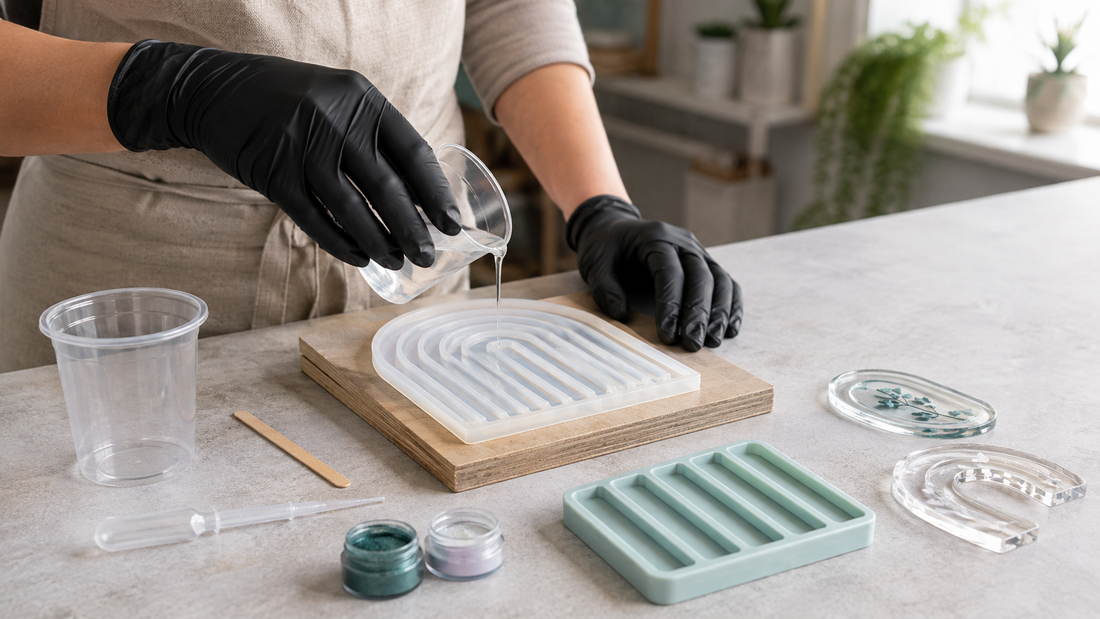 Maker carefully pouring clear resin into silicone moulds on a clean, level craft bench
